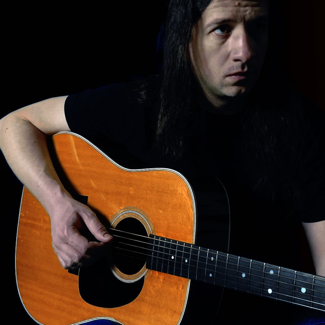 Mister Peculiar – Guitarist, singer, songwriter and composer